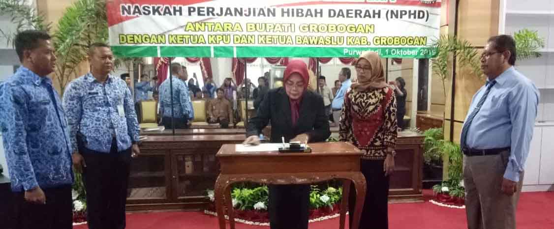  Penandatanganan NPHD Antara Bupati Grobogan dengan Ketua KPU dan Ketua Bawaslu