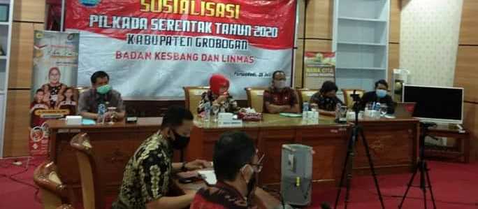 Bupati dan Perangkat Desa se-Kabupaten Grobogan Ikuti Sosialisasi Pilkada Serentak Secara Virtual