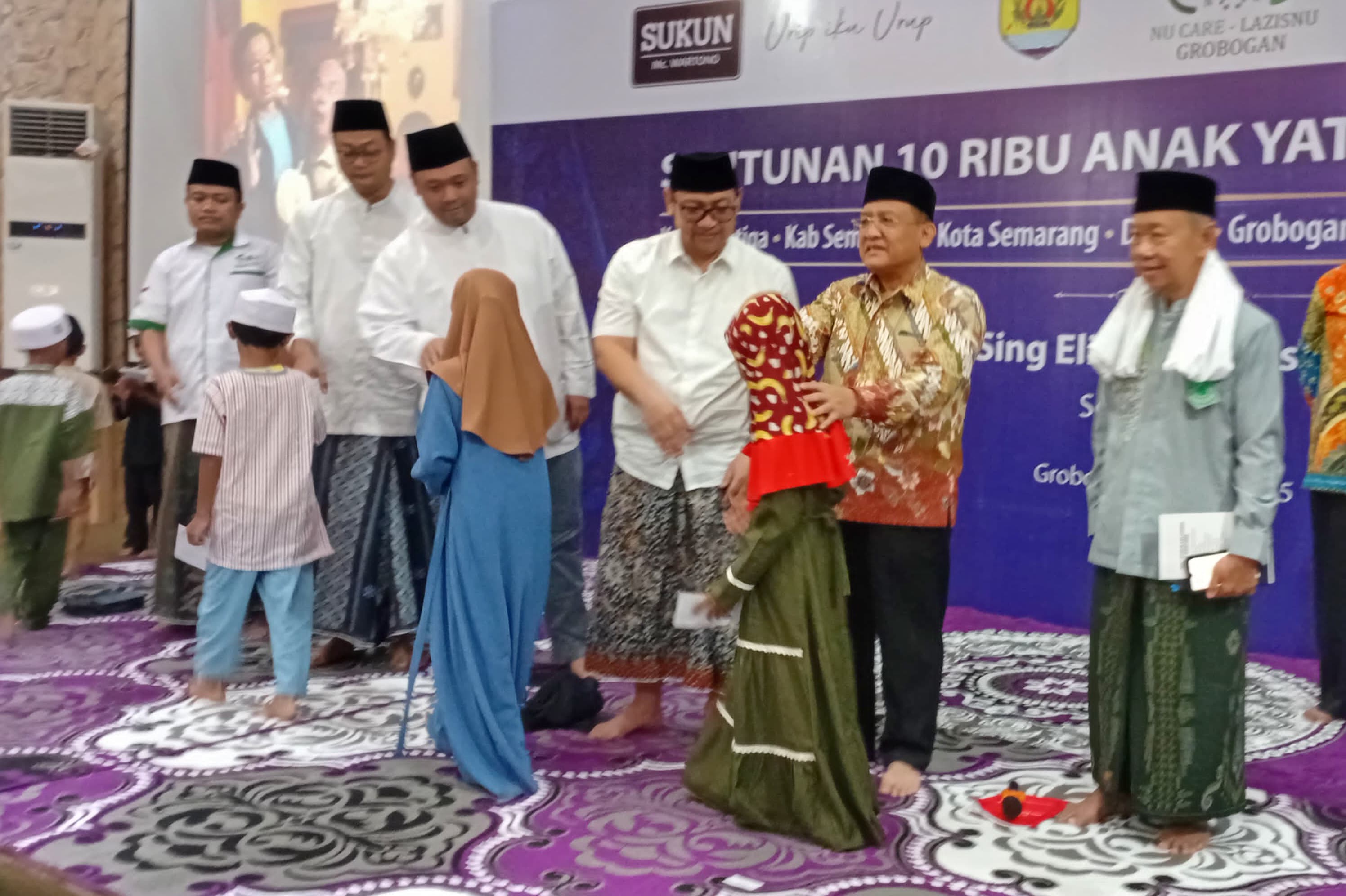 GROBOGAN BERBAGI KEBAHAGIAAN RAMADAN: 1.000 ANAK YATIM TERIMA SANTUNAN PT SUKUN